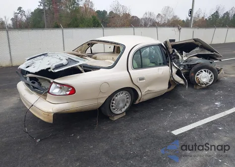 1997 Lincoln Continental z USA, uszkodzony, nr VIN 1LNLM97VXVY666570